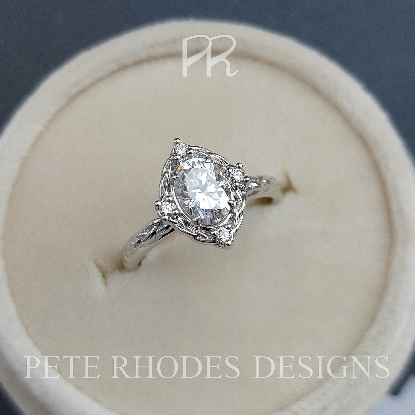 Braided Halo and Oval Charles and Colvard Moissanite Ring - LA TRESSÉE