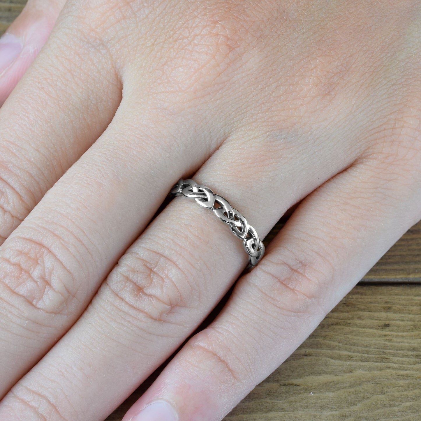 overhand knot ring in white gold on finger