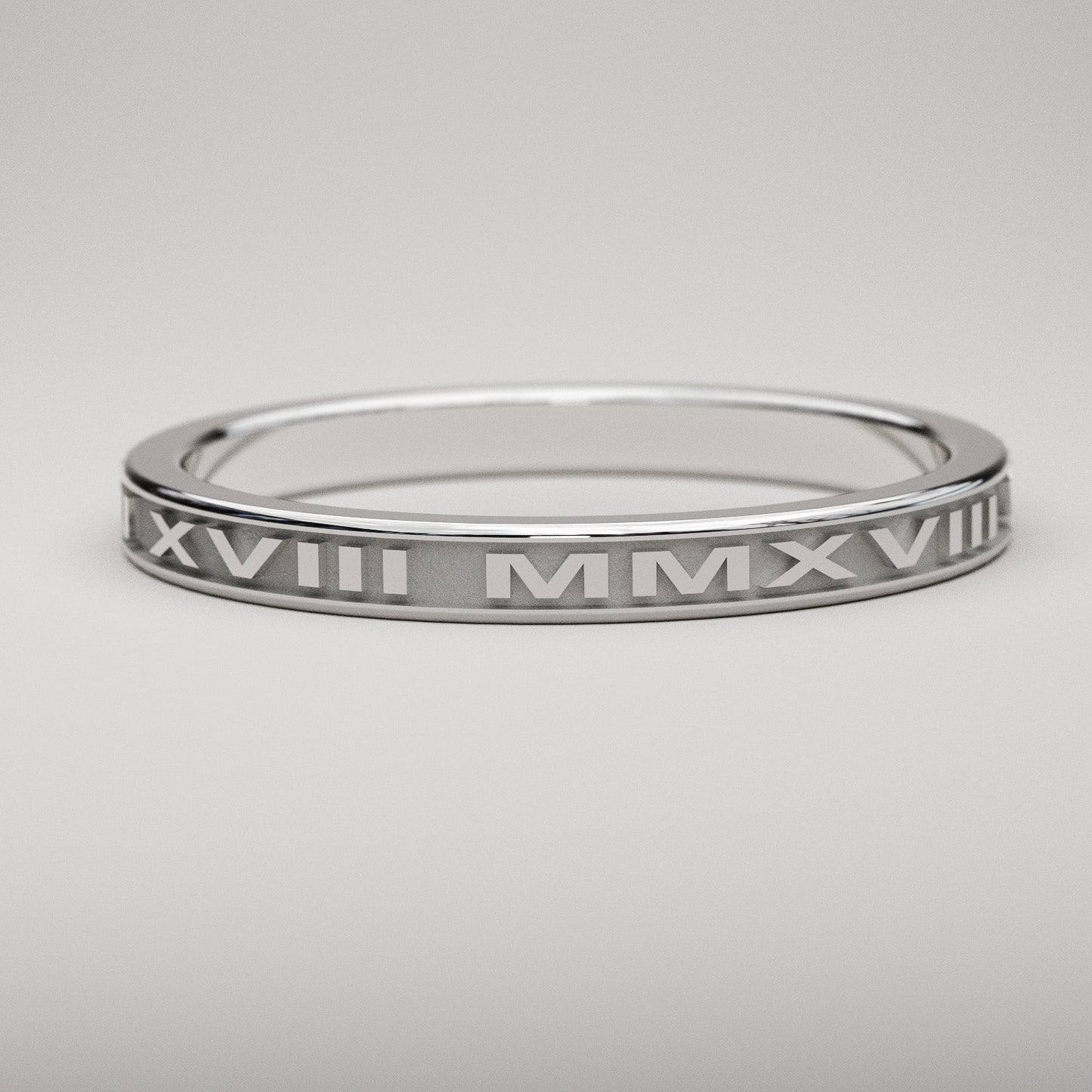 Custom date ring in 14k white gold featuring your date in Roman Numerals