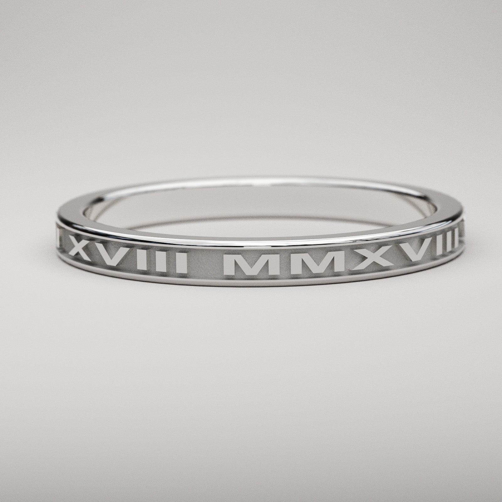Custom date ring in 14k white gold featuring your date in Roman Numerals