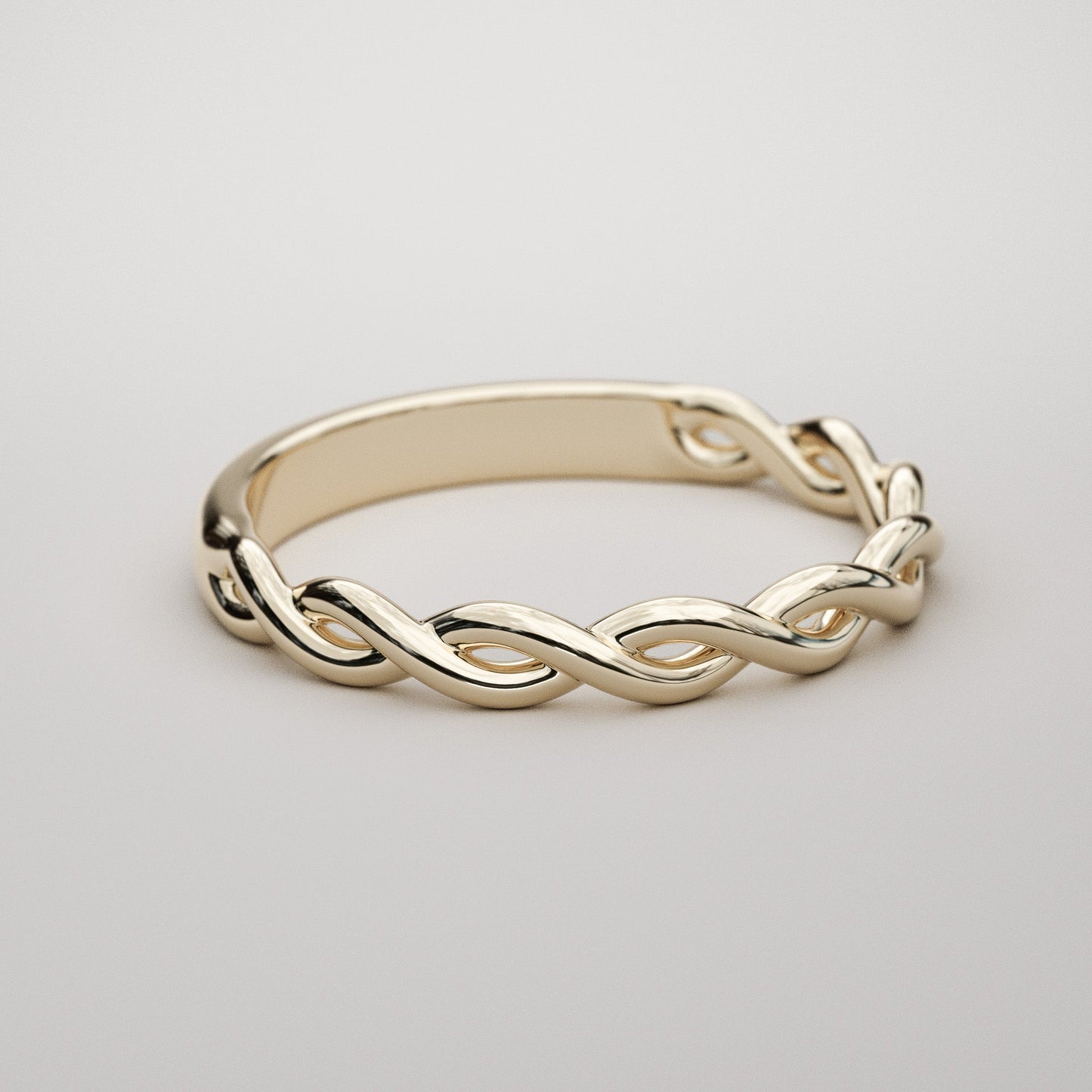 Braid wedding band in yellow gold