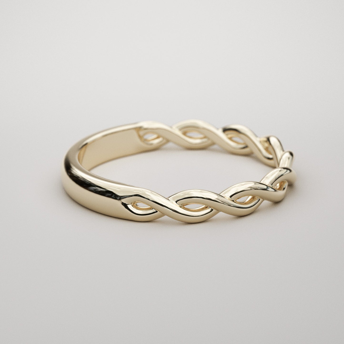 braid ring in yellow gold by Pete Rhodes