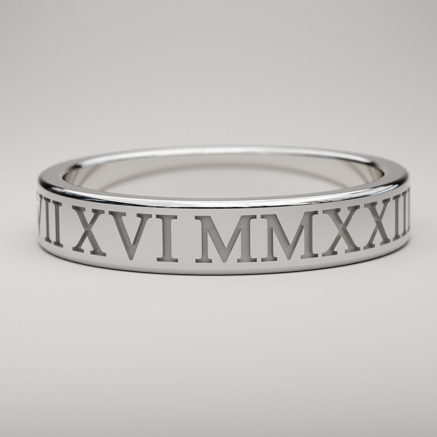 inset custom date Roman Numeral ring in white gold, 4mm wide