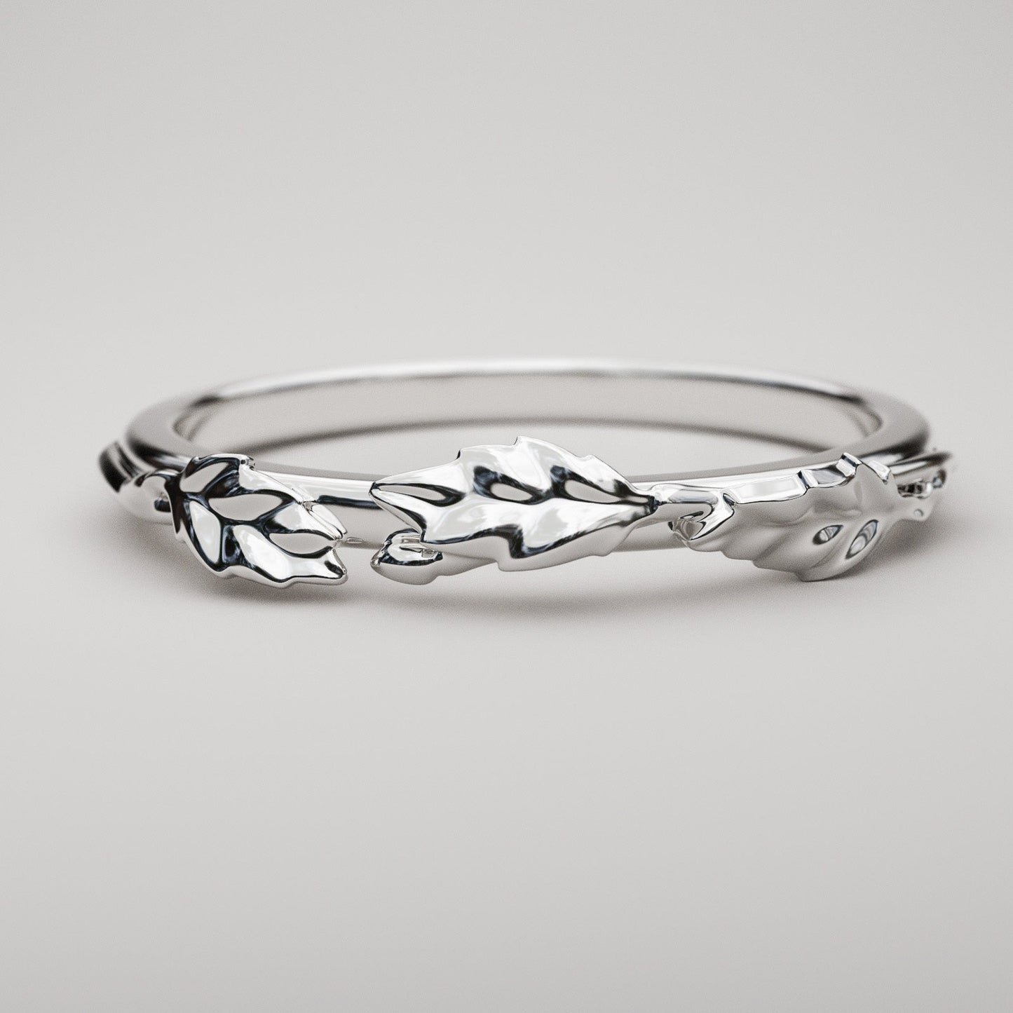 white gold wedding band with leaves