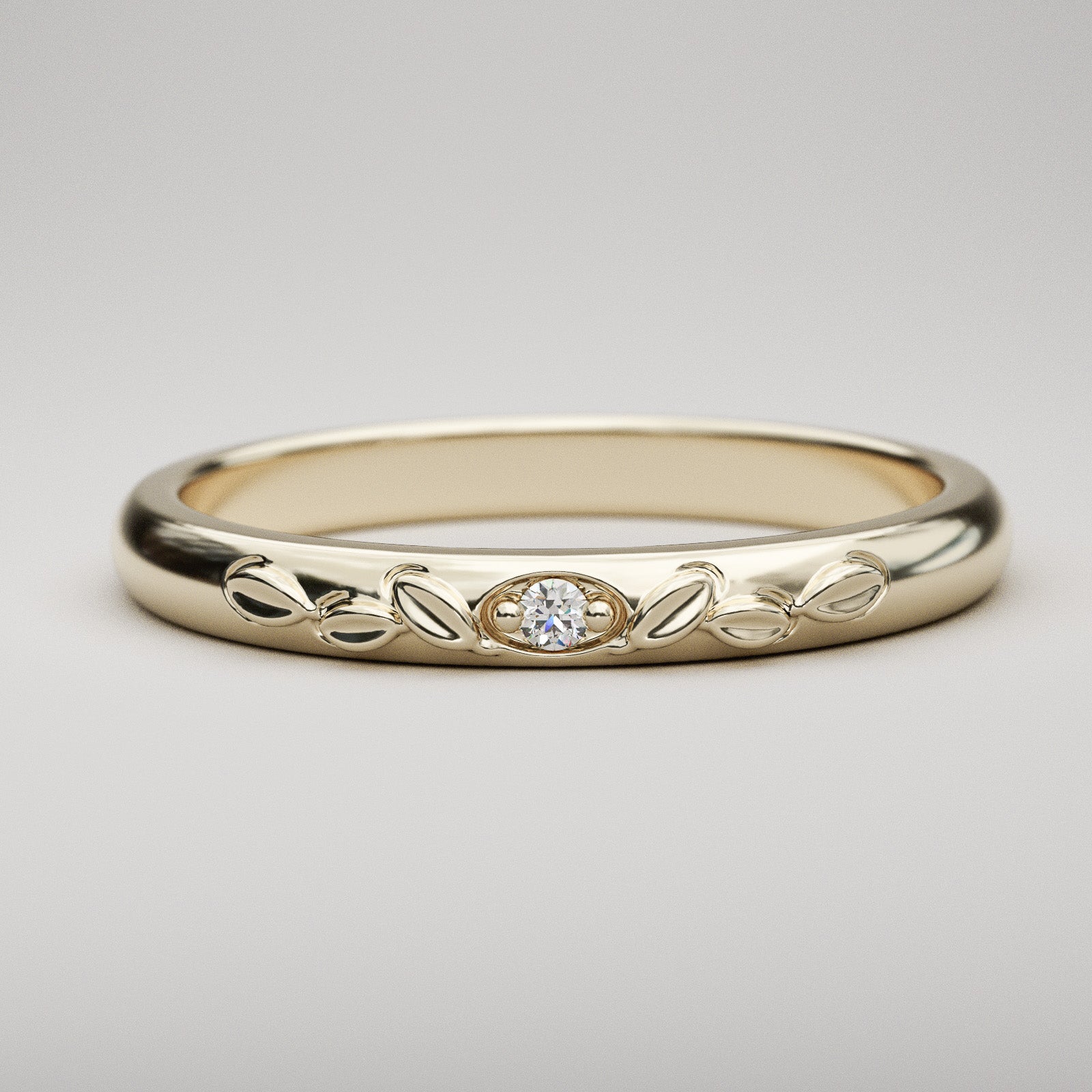 Unique vintage inspired wedding band with leaves and small diamond