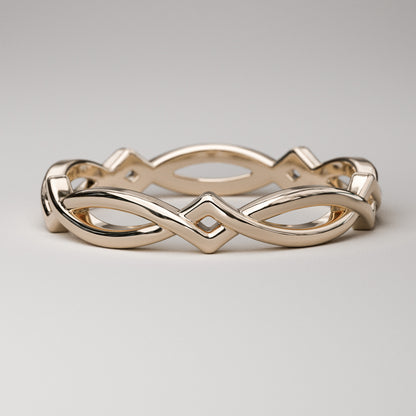Simple Celtic weave band in solid 14k rose gold by Pete Rhodes