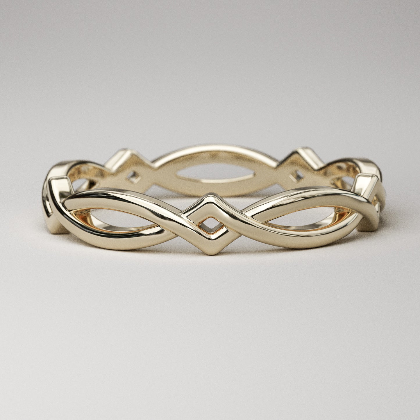 Simple Celtic weave band in solid 14k or 18k gold by Pete Rhodes