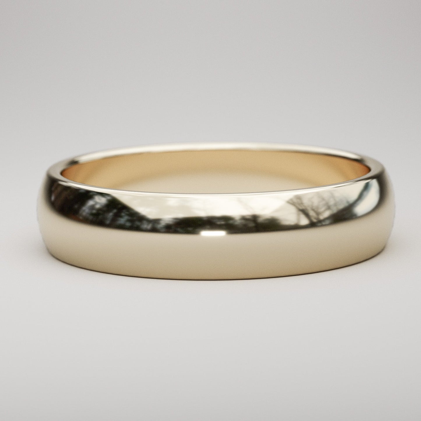 5mm wide simple wedding ring in 14k yellow gold