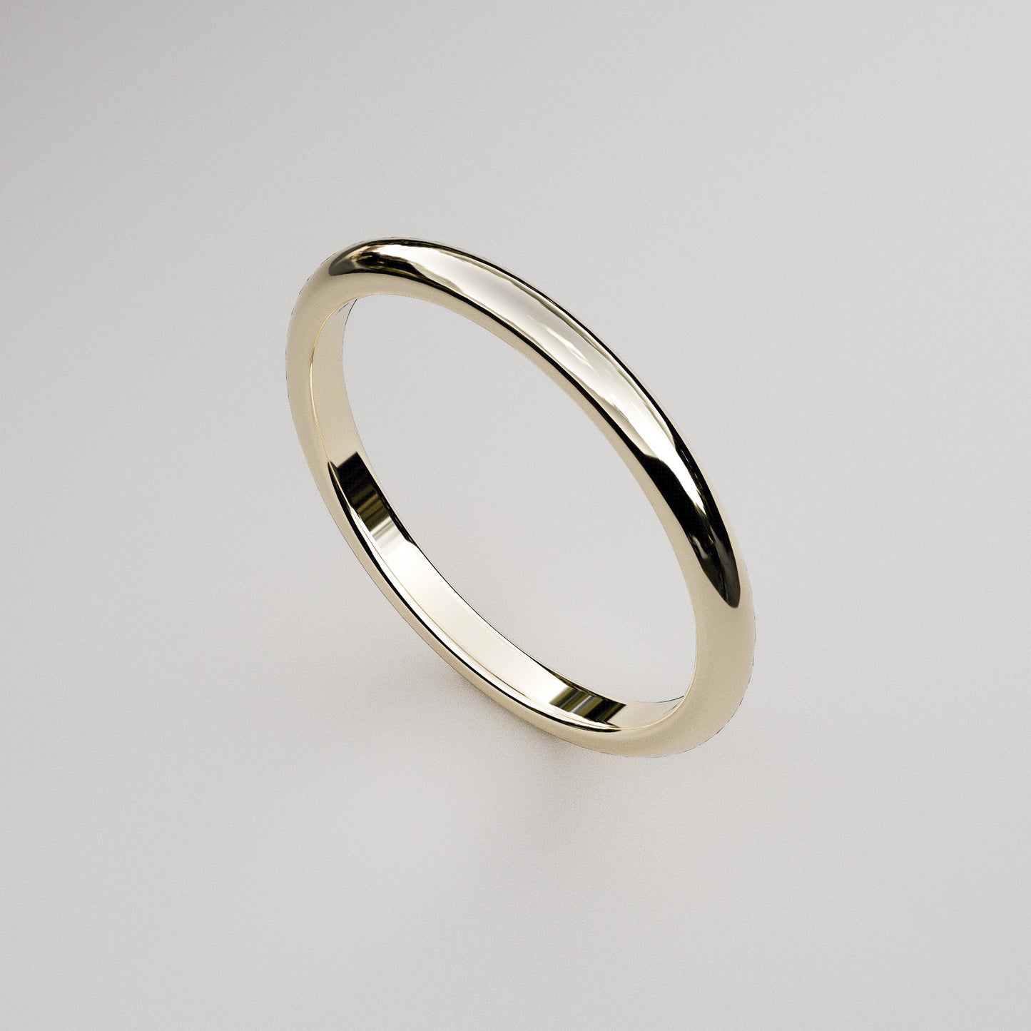 traditional 2mm wide wedding band in yellow gold