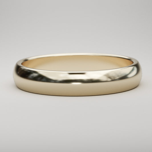 simple 4mm wide wedding band in yellow gold
