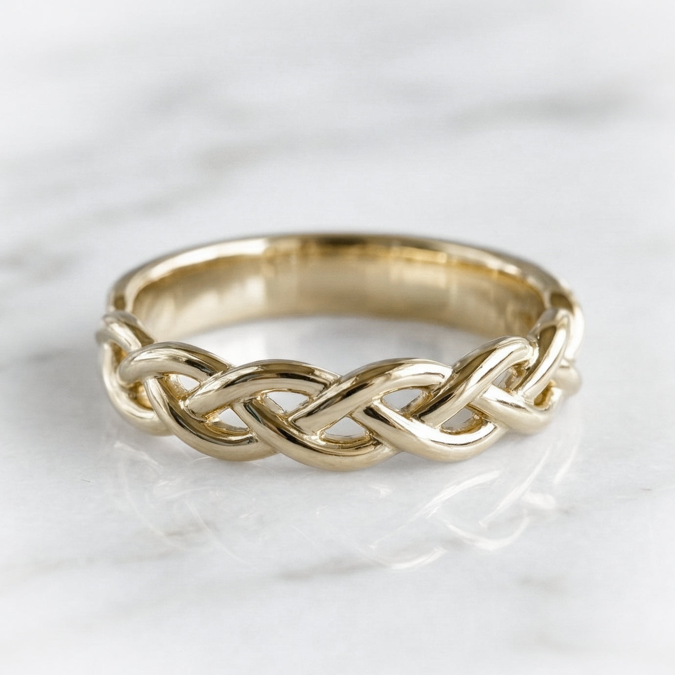 Celtic inspired gold braided ring 