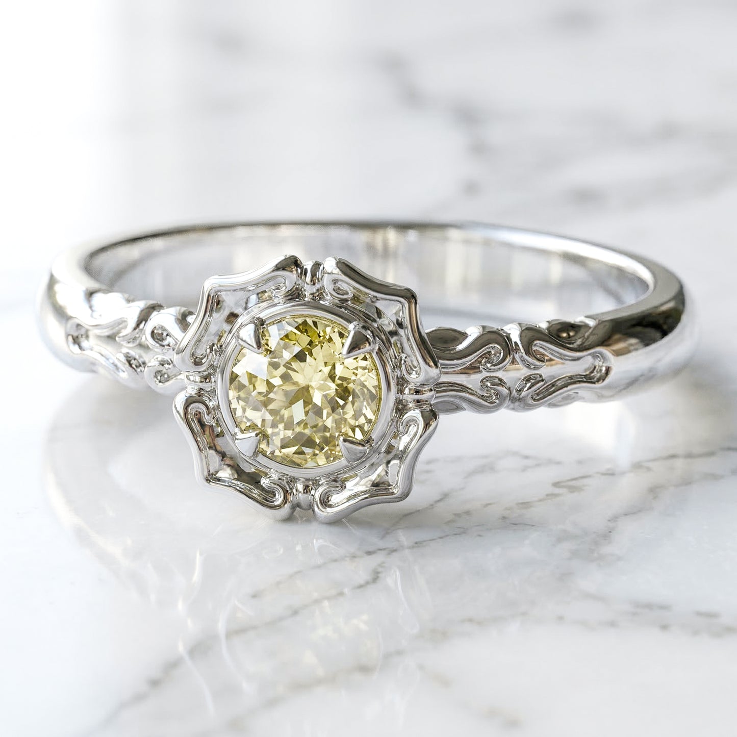 A lab created light yellow sapphire centerpiece engagement ring with a stylized flower petal setting, made of white gold.