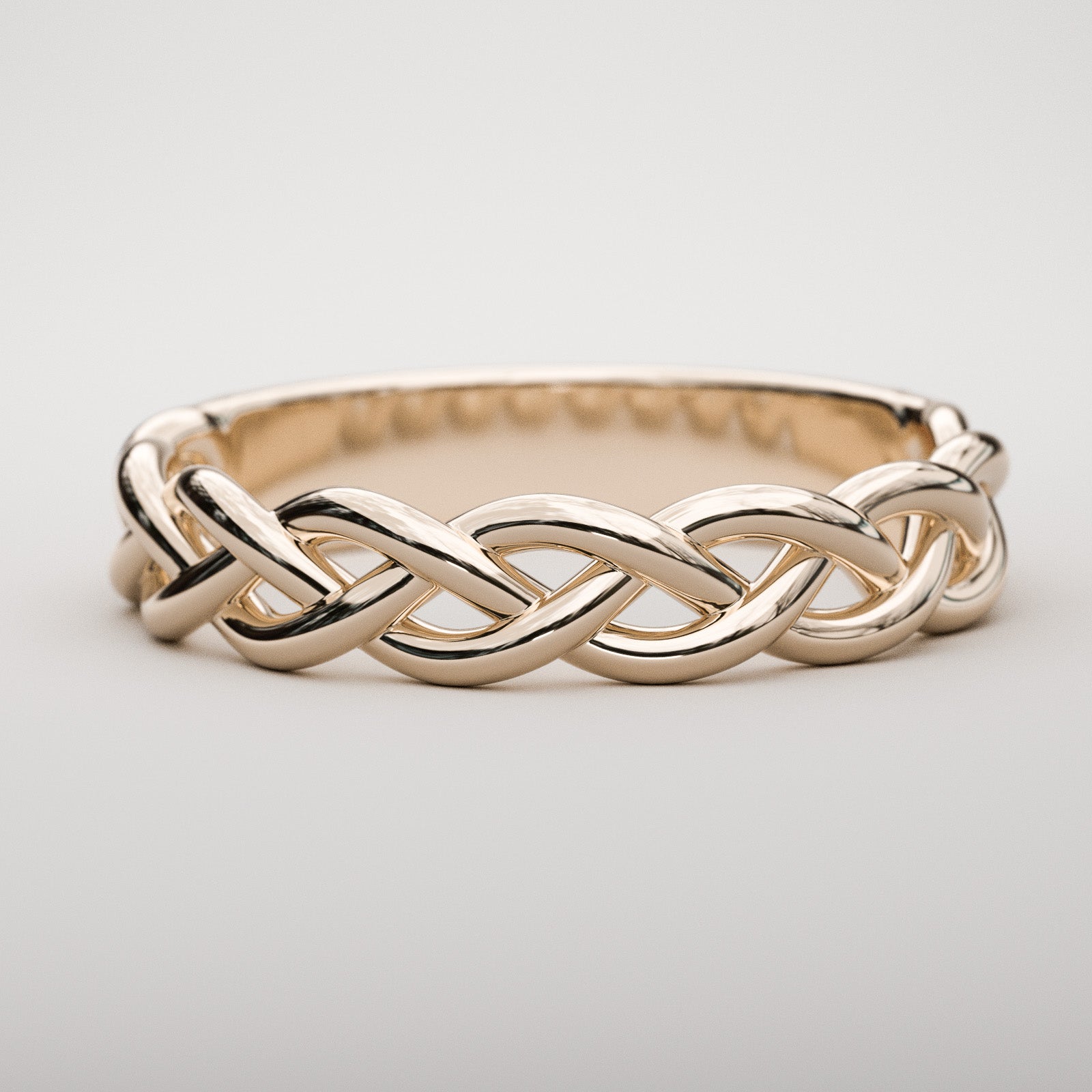 Braided rose gold band