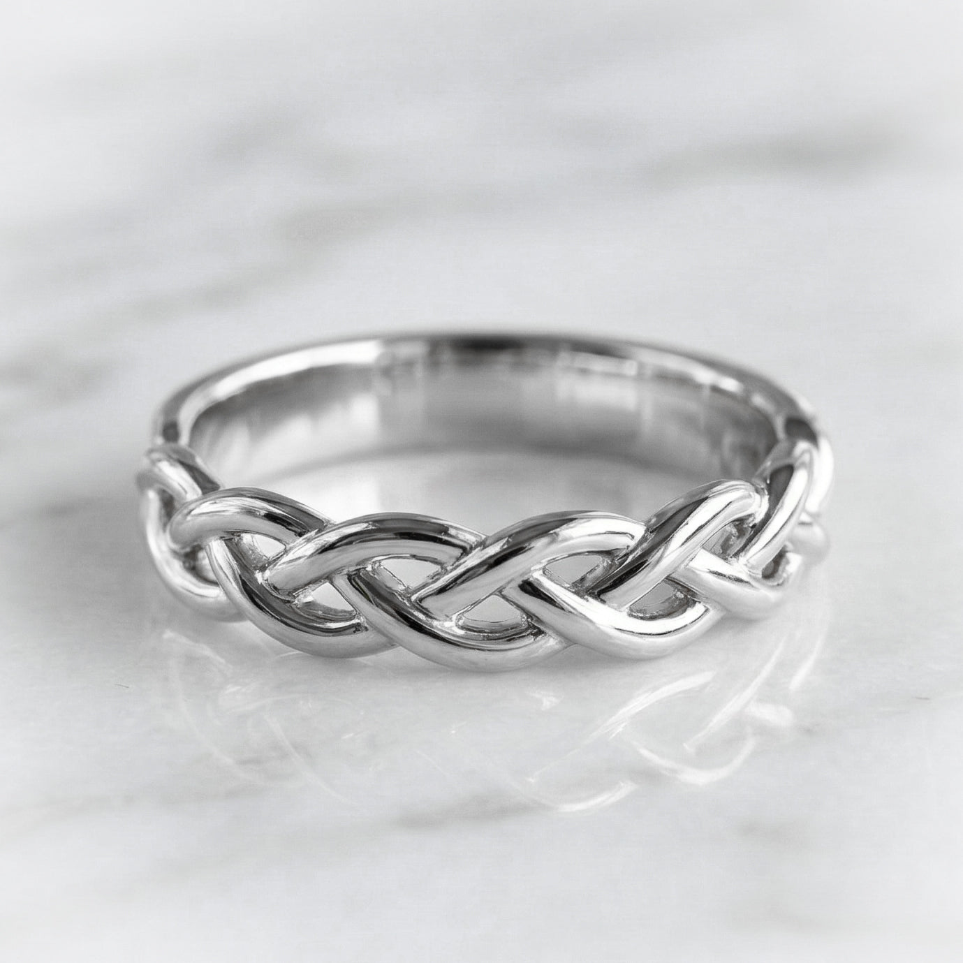Celtic inspired white gold braided ring 