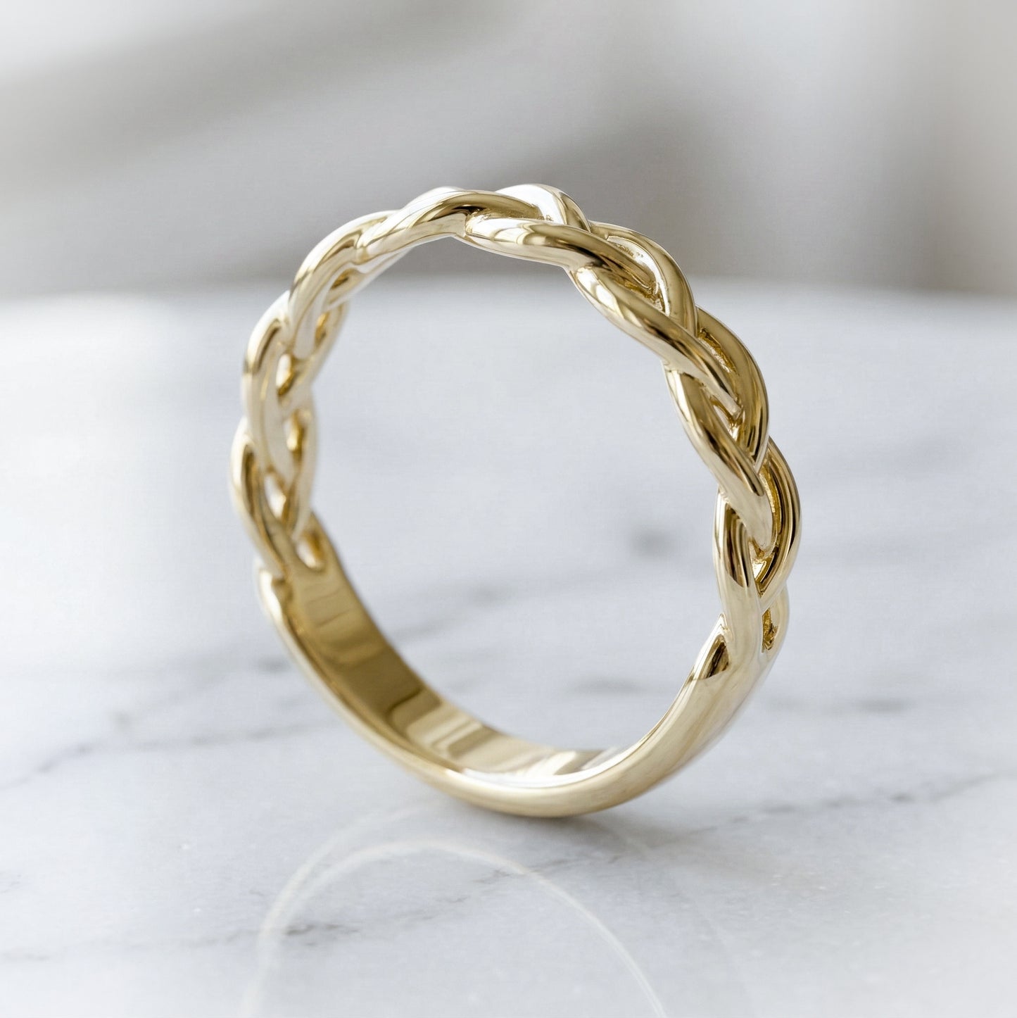 Celtic inspired yellow gold braided ring