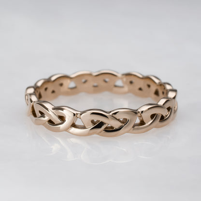 Unique 14k rose gold wedding band - simple knot Celtic eternity ring