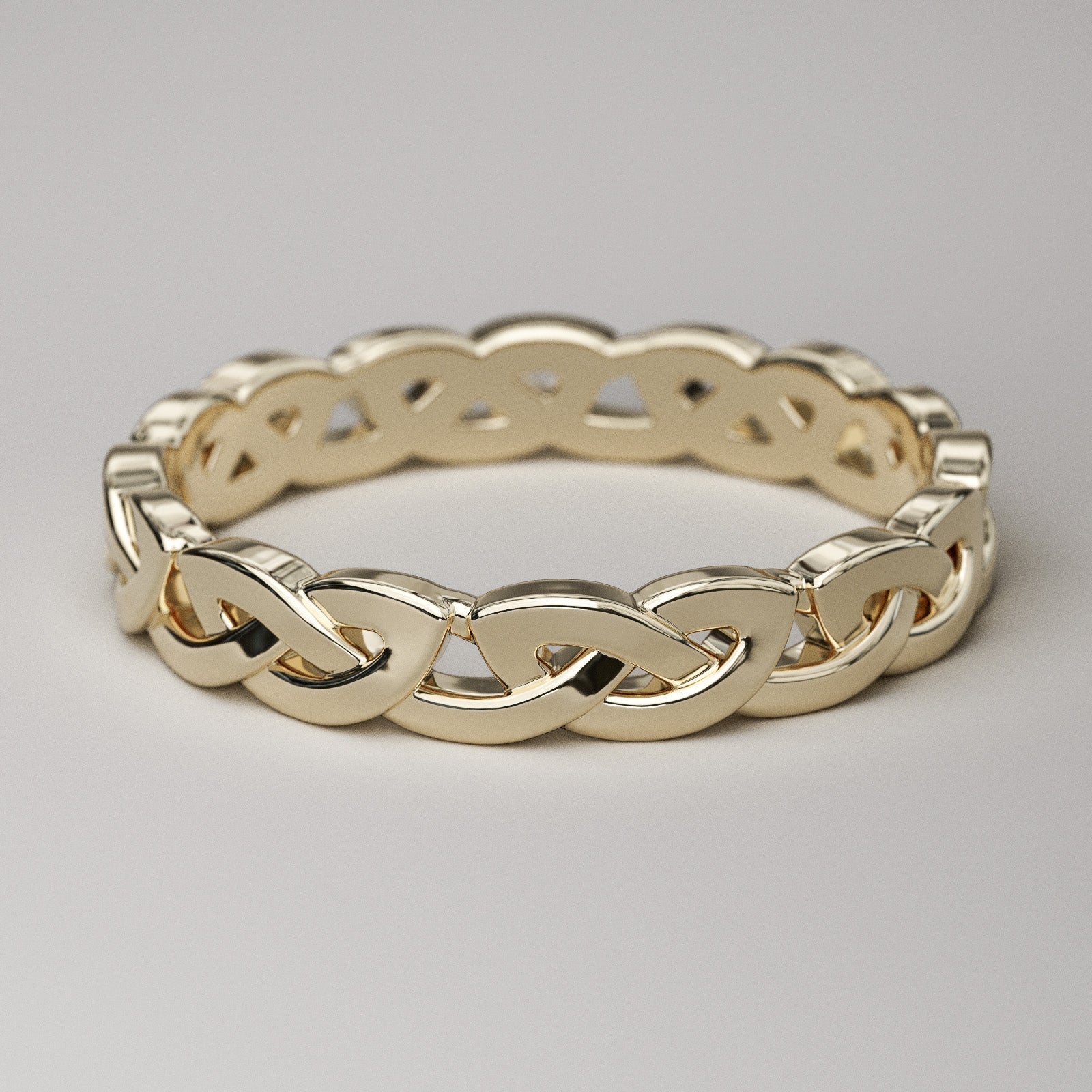 Yellow gold Celtic wedding band - overhand knot eternity ring for women