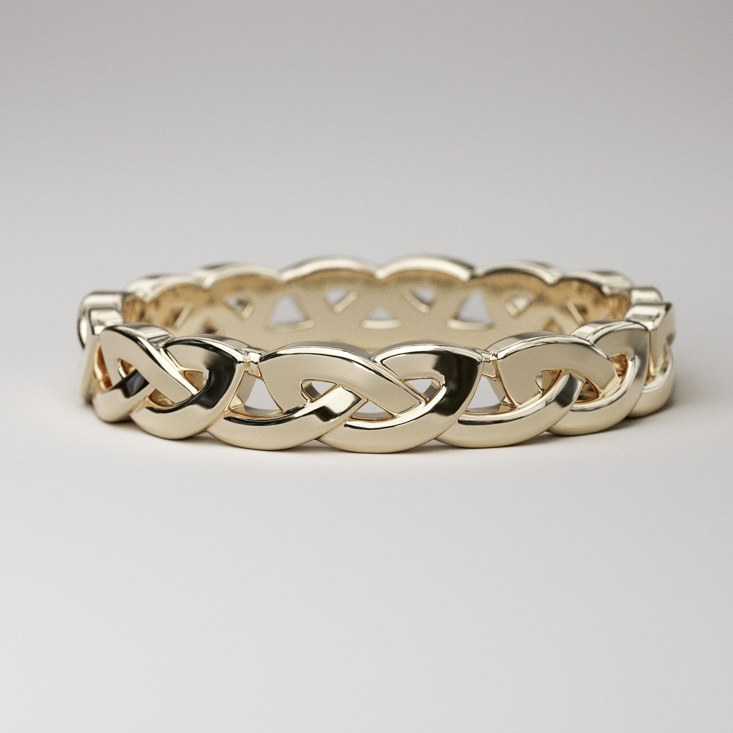 Yellow gold Celtic wedding band - overhand knot eternity ring for women