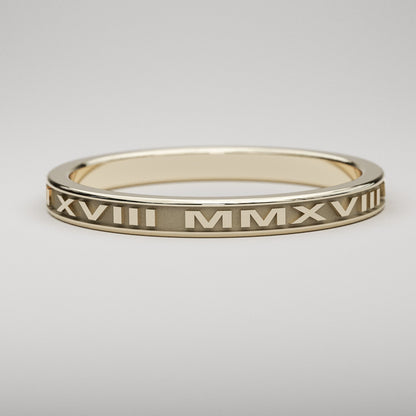 Custom date ring in 14k yellow gold featuring your date in Roman Numerals