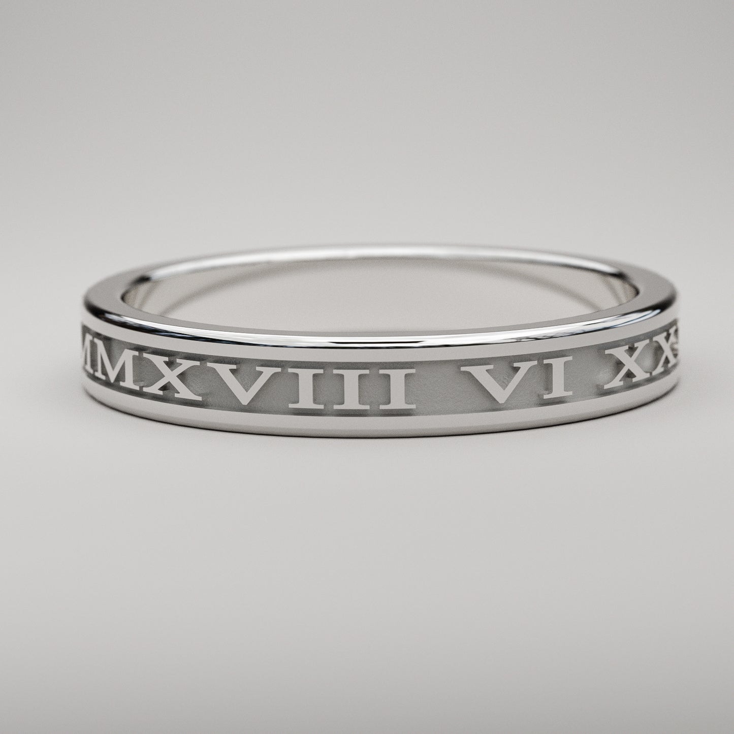 Custom date Roman Numeral ring in solid white gold, 3mm wide