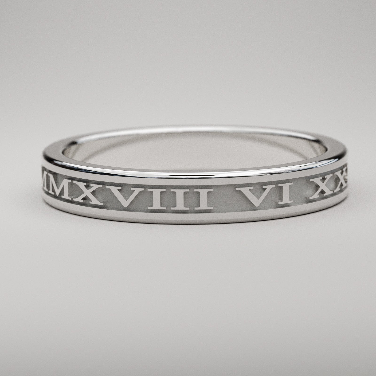 Custom date Roman Numeral ring in solid white gold, 3mm wide