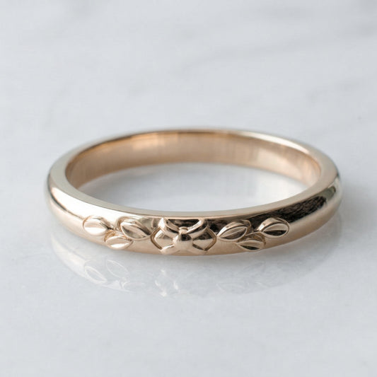 Rose gold ring with floral design, antique inspired