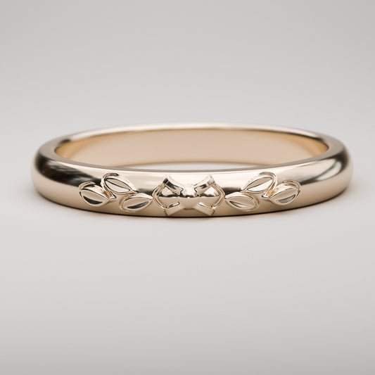 Leaf design wedding band with classic vintage styling for woman in rose gold