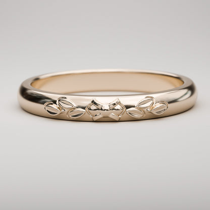 Rose gold wedding band with leaf design for woman in 14k or 18k gold