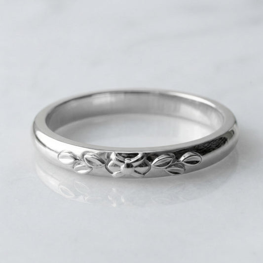 white gold ring with floral design