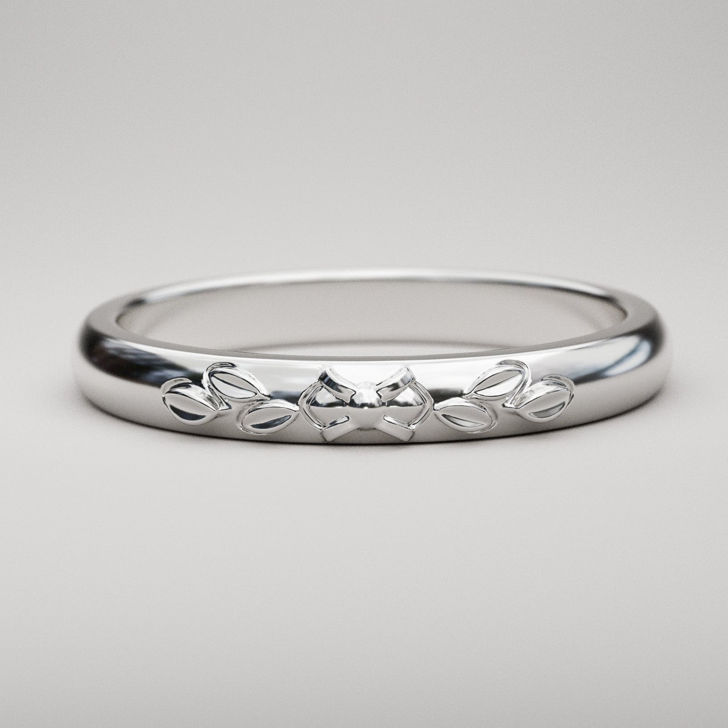 Leaf design wedding band with classic vintage styling for woman in white gold