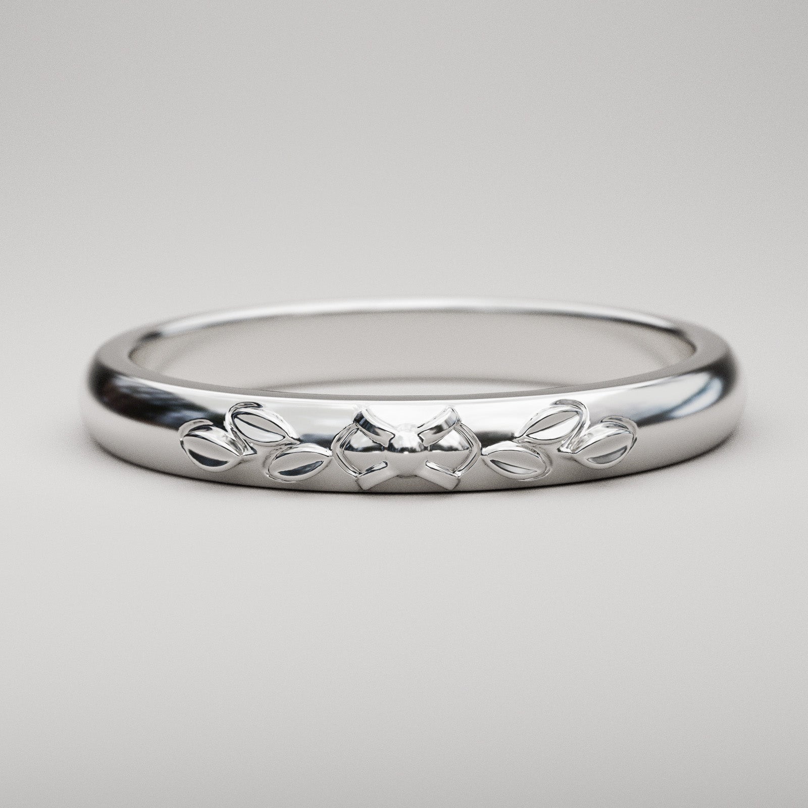 Leaf design wedding band with classic vintage styling for woman in white gold