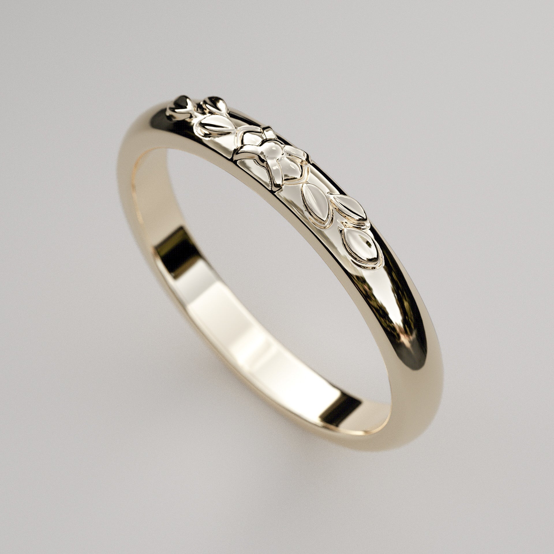 Yellow gold wedding band with leaf design for woman in 14k or 18k gold