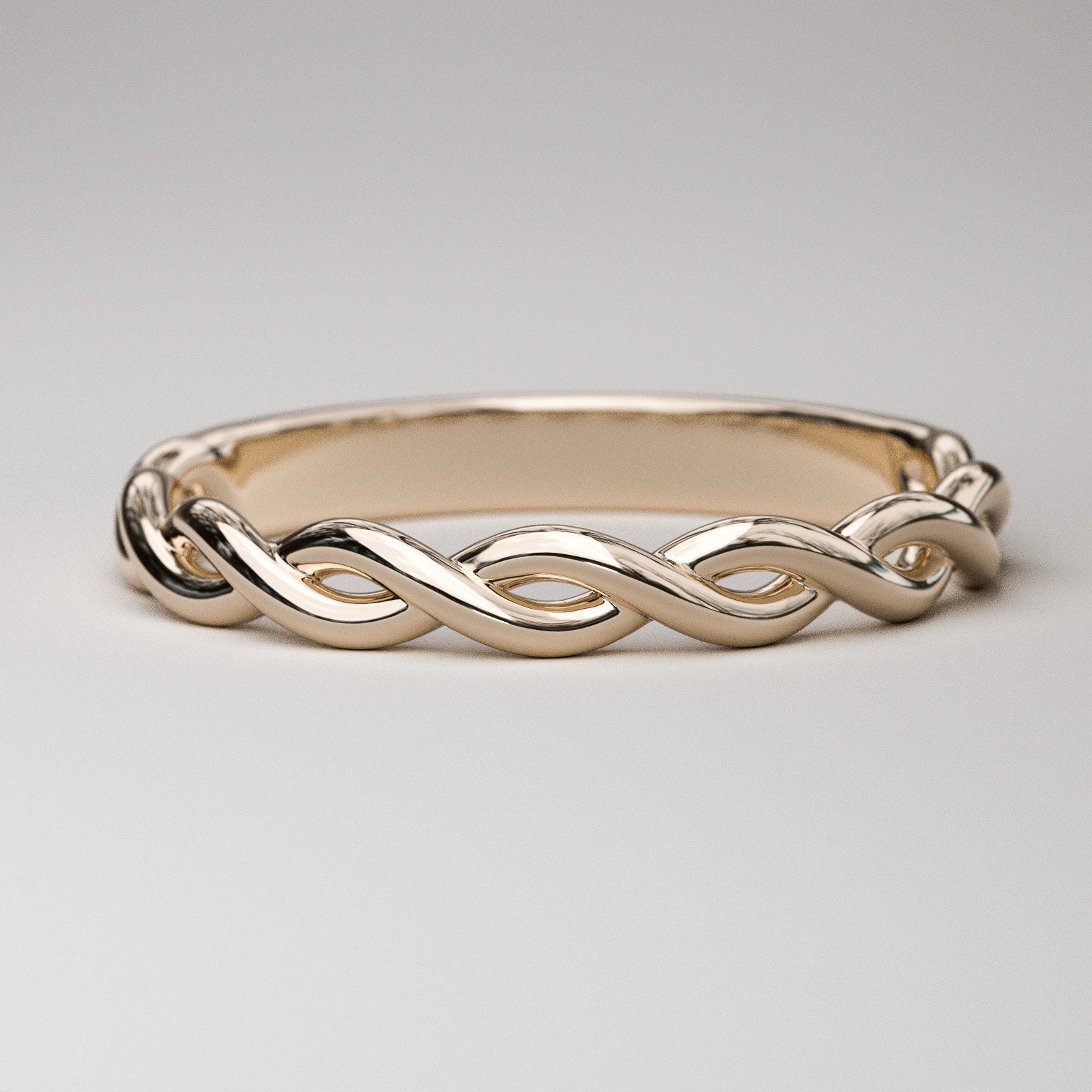 woven gold band in rose gold by Pete Rhodes