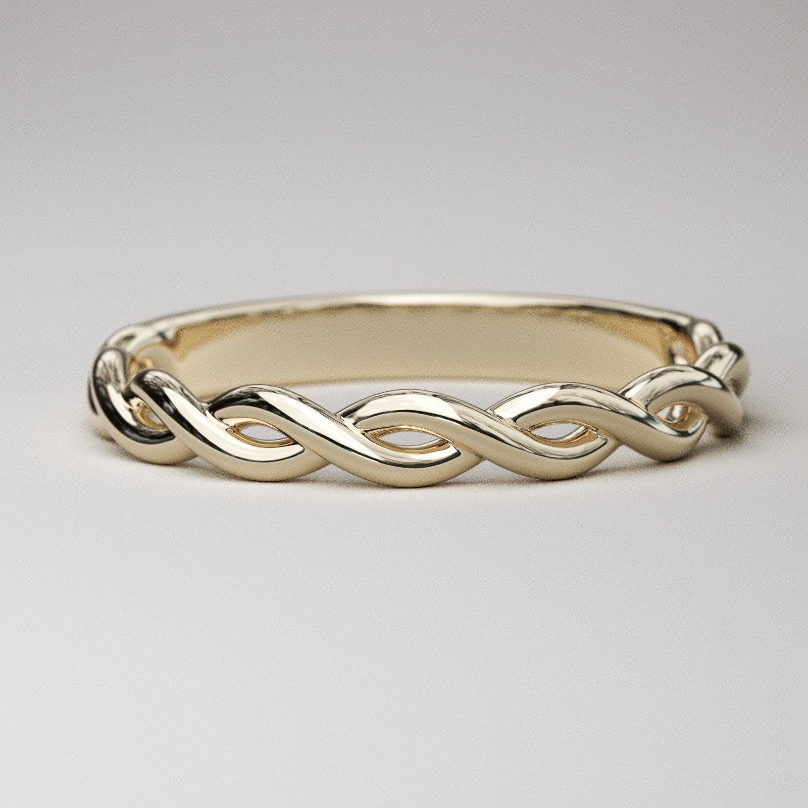woven gold band in yellow gold by Pete Rhodes