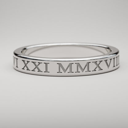 inset custom date Roman Numeral band in white gold