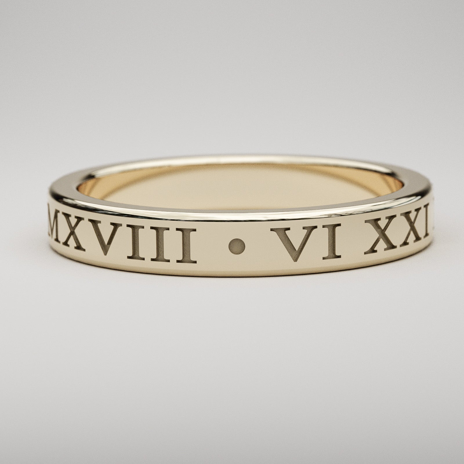 inset custom date Roman Numeral band in yellow gold