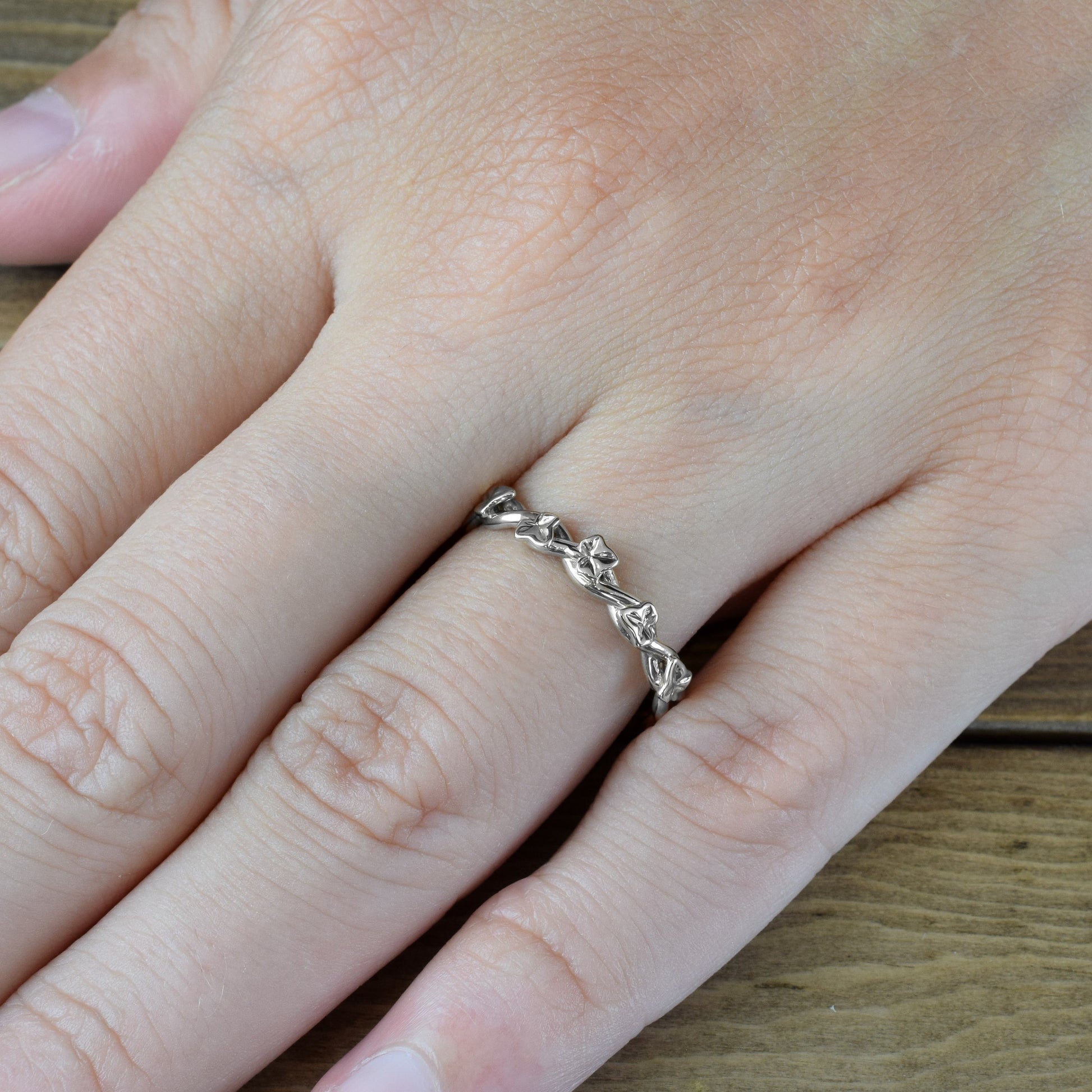 intertwined ivy ring in white gold on hand