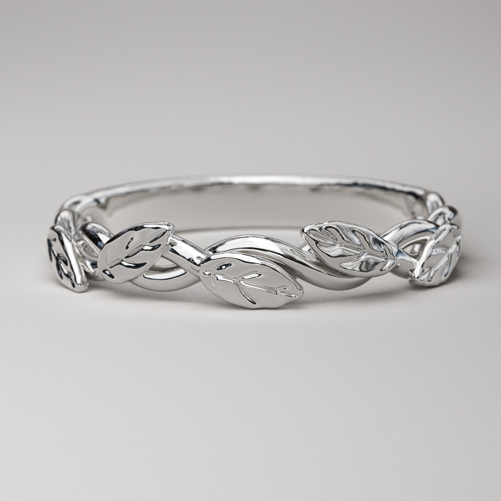 Nature inspired ring with leaves in white gold