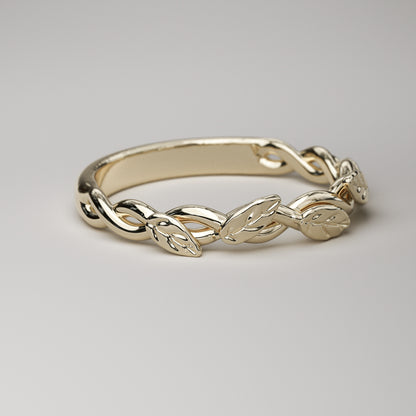 dainty leaf and vine wedding band in yellow gold