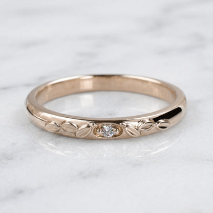 Classic domed gold band with genuine diamond and leaf details