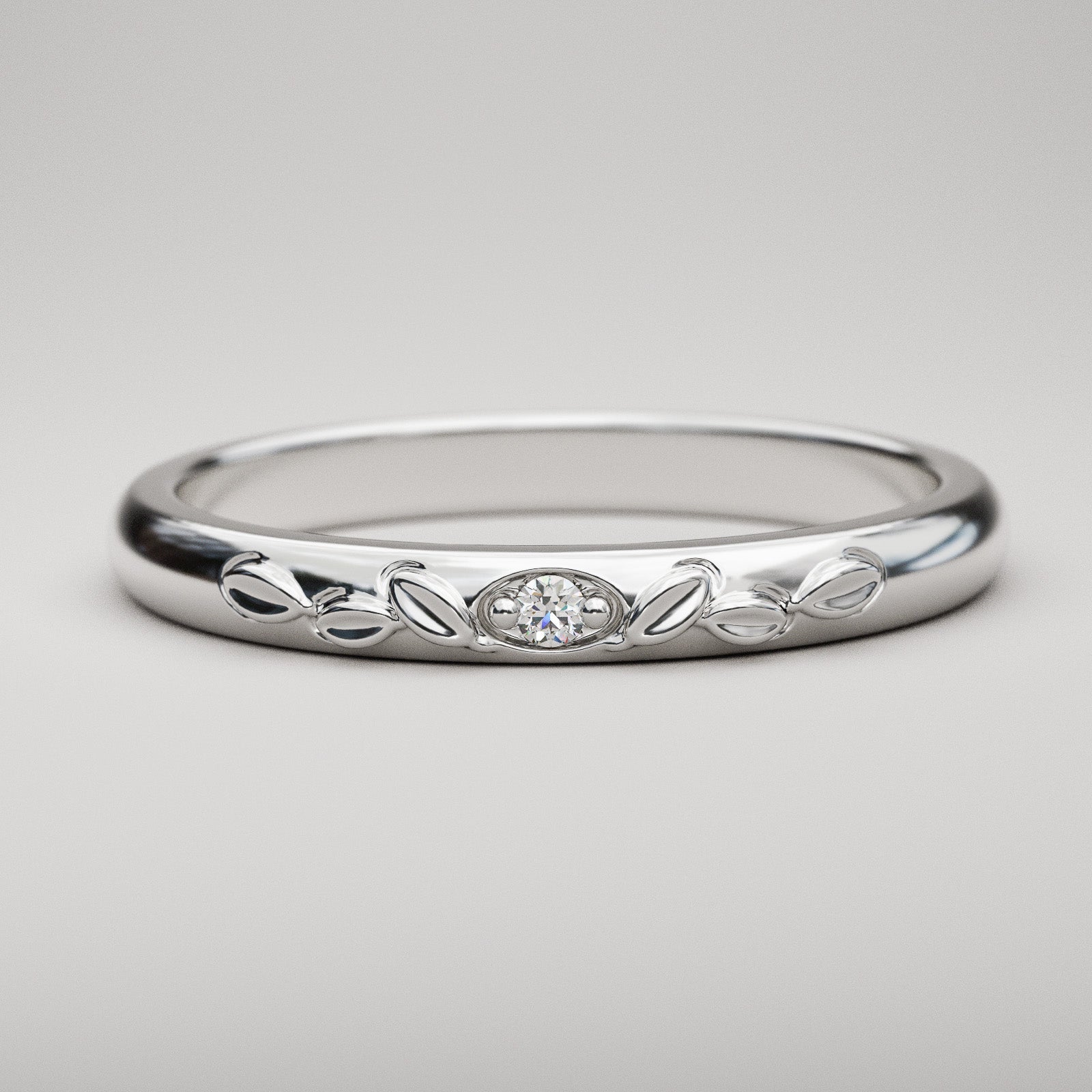 Classic domed white gold band with genuine diamond and leaf details
