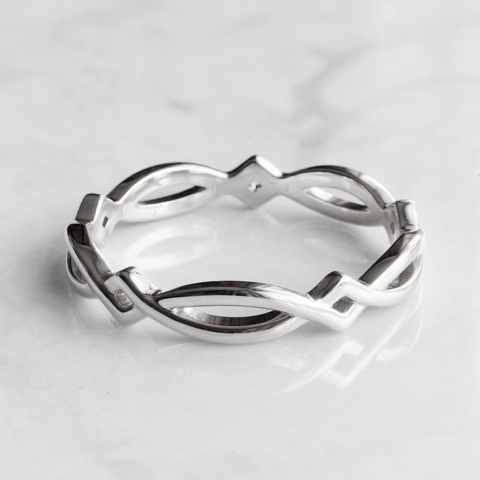 simple Celtic band in white gold