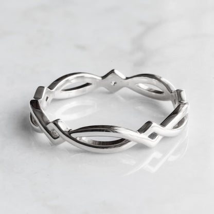 simple Celtic band in white gold