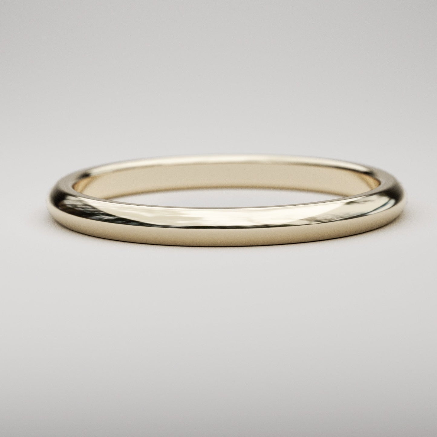 traditional 2mm wide wedding band in yellow gold